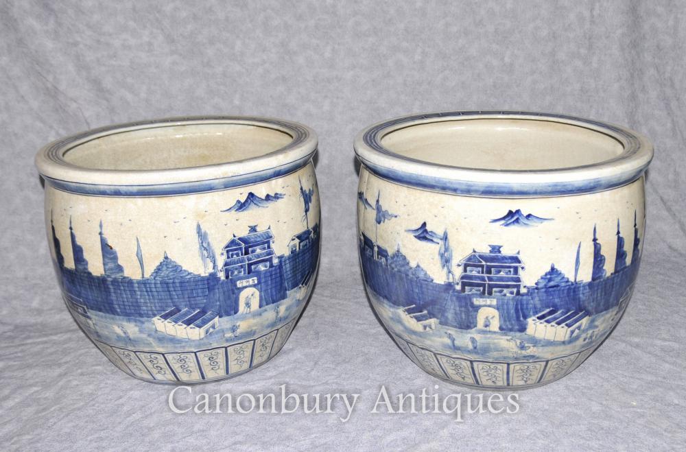 Paire de porcelaines chinoises Kangxi bleu et blanc Pots