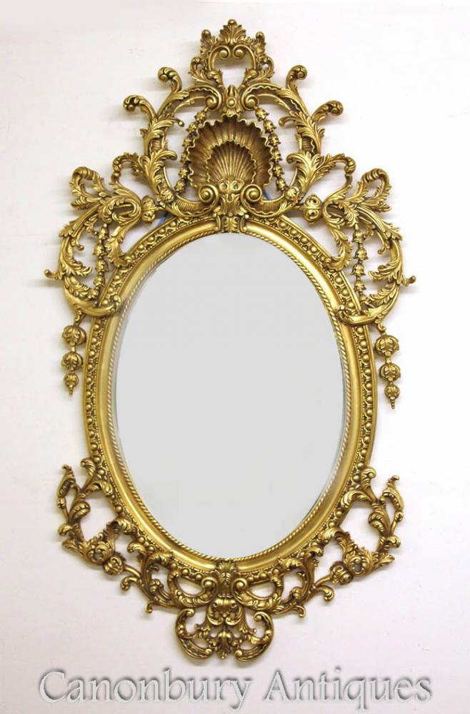 Cadre doré de style Rococo miroir ovale grand Français Louis XVI