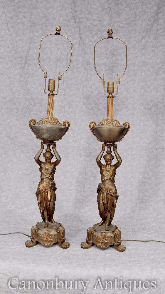 Parell de llums antics de bronze femení de taula de taula