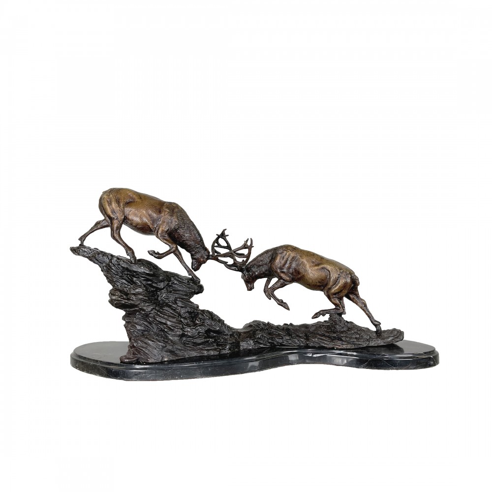 Paire de cerfs en bronze combattant des cerfs coulés monarque écossais